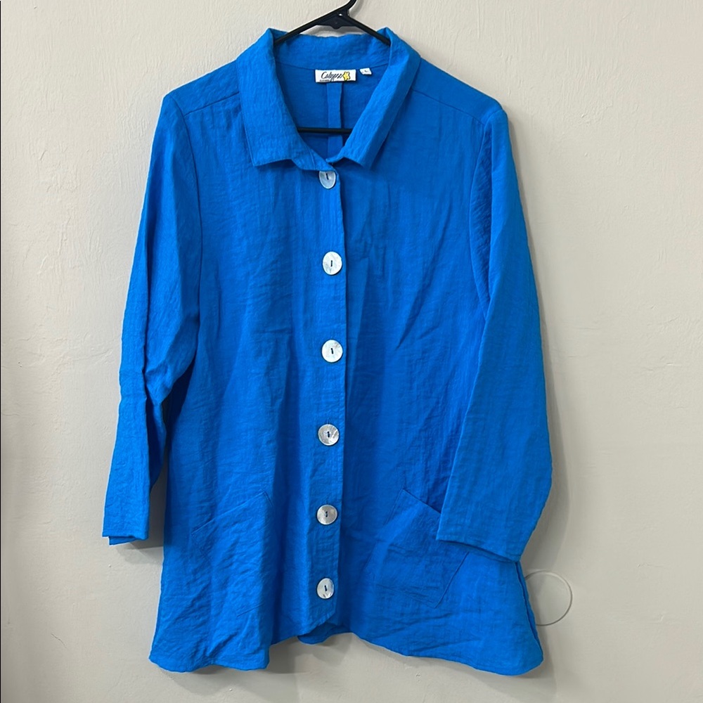 Calypso Bright Blue Button-Up Asymmetrical Hem Long Sleeve Textured Fabric Top